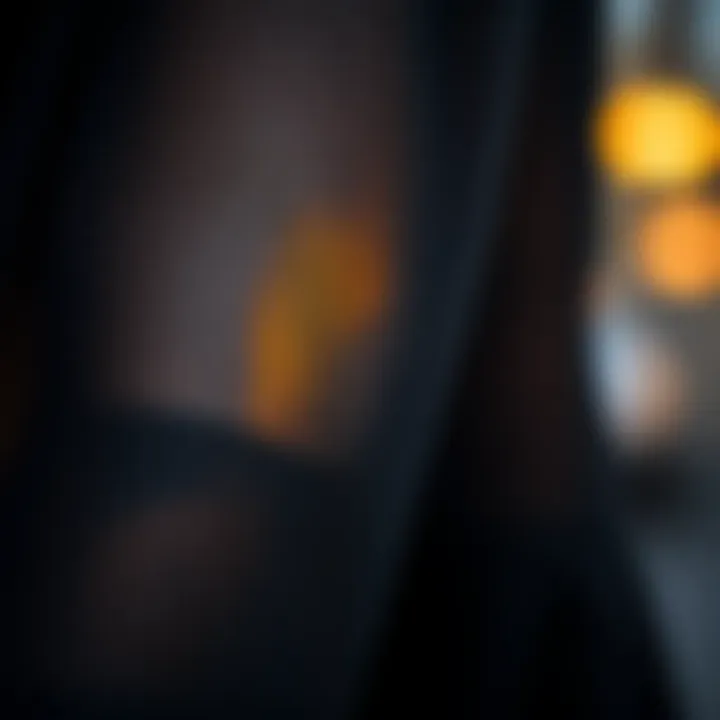 Fabric Texture of Black Mesh Flare Pants Close-up of the fabric texture of black mesh flare pants