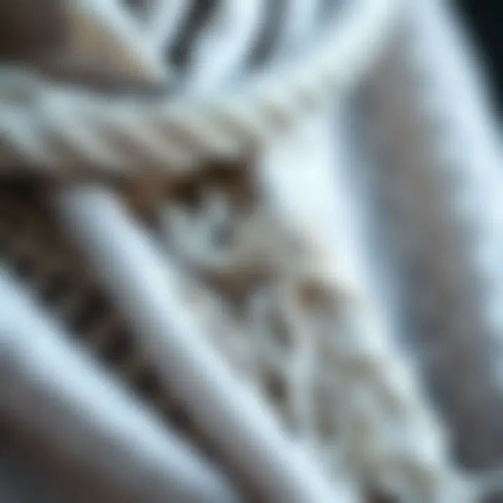 Intricate Fabric Details Close-up of the intricate fabric composition of a metallic silver shawl