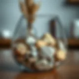 A variety of decorative rocks in earthy tones arranged aesthetically in a glass vase.