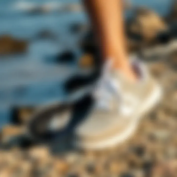 Stylish designer water shoes displayed on a rocky shore