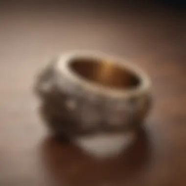 An eagle ring displayed on a wooden surface, highlighting its elegant design