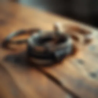 A stylish arrangement of various minimalist bracelets on a natural wooden surface