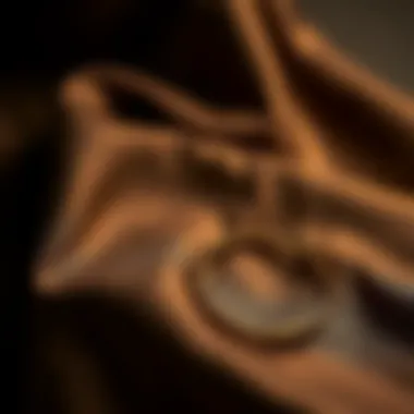 An elegant minimalist bracelet elegantly draped across a luxurious fabric