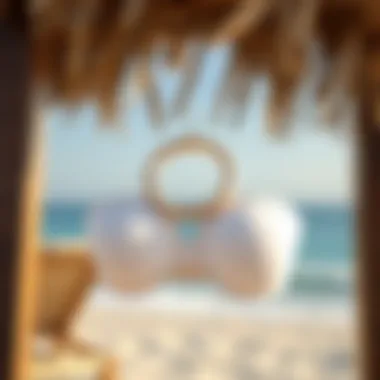 Stylish O ring bandeau bikini top displayed on a beach setting