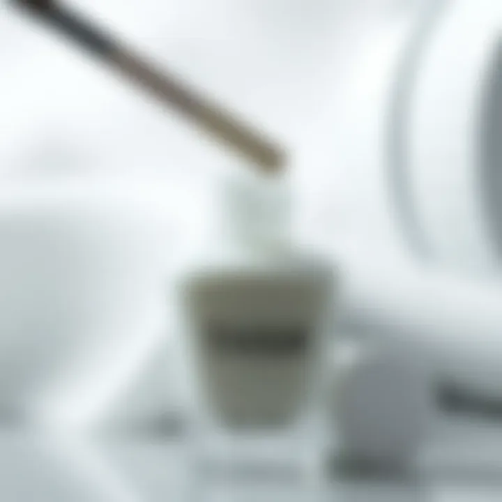 Close-up of sheer milky white gel polish bottle with brush