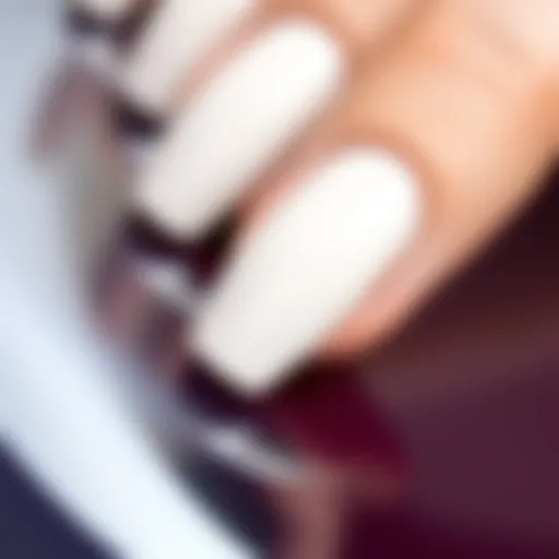 Elegant sheer milky white gel polish on a glossy surface