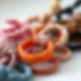 Diverse Colors and Textures of Knotted Elastic Hair Ties A close-up view of various knotted elastic hair ties showcasing different colors and textures