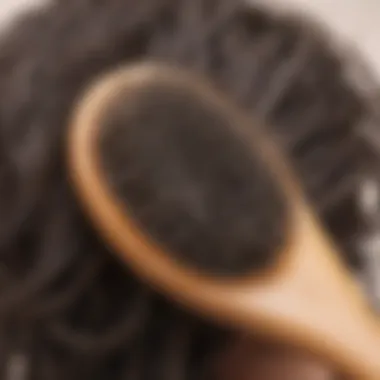 A close-up of a tangled hairbrush with strands of hair caught in it