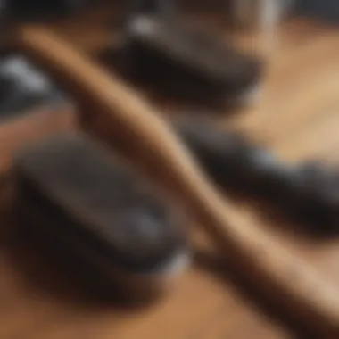 A variety of hairbrushes displayed on a wooden surface