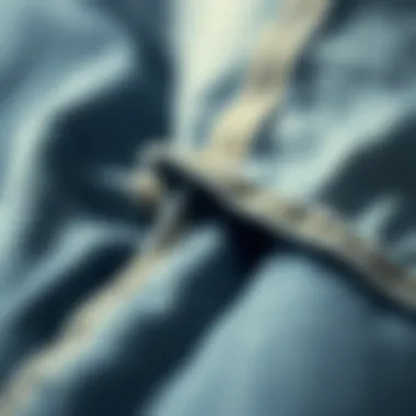 Close-up of raw hem detailing on denim