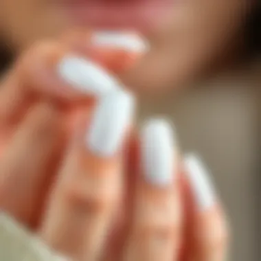 Elegant application of sheer milky white gel polish on nails