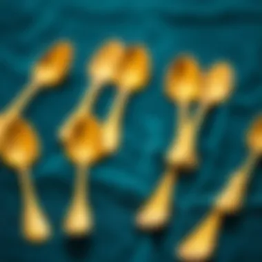 A Display of Luxury A collection of gold espresso spoons displayed on a velvet cloth