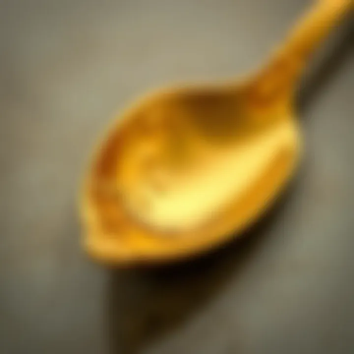 Craftsmanship Revealed Close-up of intricate detailing on a gold espresso spoon