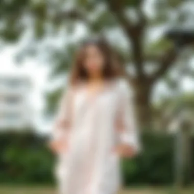 Casual outfit featuring the curved hem shirt dress in a natural setting