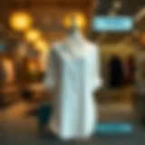 Elegant Display of a Curved Hem Shirt Dress Elegant curved hem shirt dress displayed on a mannequin