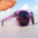 Stylish acrylic sunglasses resting on a vibrant beach backdrop