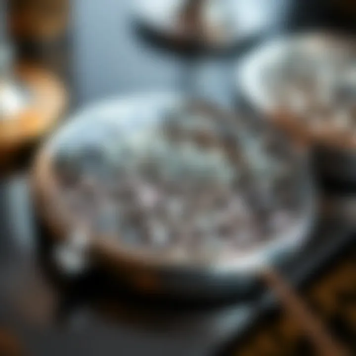 Close-up of intricate design on a silver compact mirror