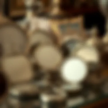 Artistic display of vintage silver compact mirrors