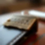 A close-up view of a stylish retractable card clip showcasing its intricate design and finish