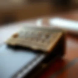 A close-up view of a stylish retractable card clip showcasing its intricate design and finish